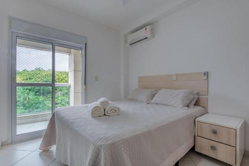 Apartamento Gourmet Asturias - Varanda com churrasqueira de frente para a praia no Guaruja