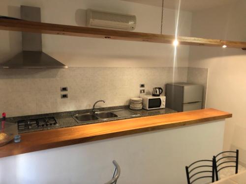 Kitchen, Skyandsand Alghero in La Pietraia