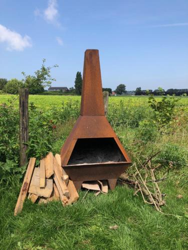 Huisje op Bioboerderij, kust, polder en rust