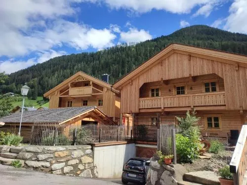 Schlosswirt Chalets & Apartments in Großkirchheim, Österreich