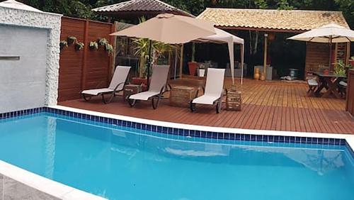 Casa com piscina e churrasqueira em Massaguaçu SP