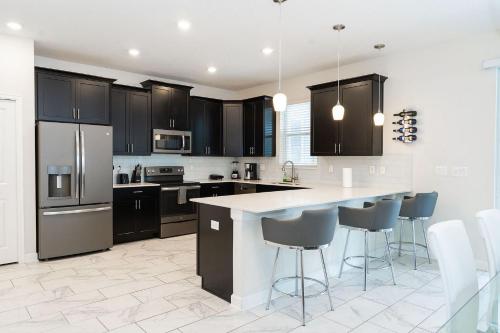 1578 - Beautiful spacious house near Disney with Private Pool & FREE grill use in Champions Gate Oasis Resort - image 3