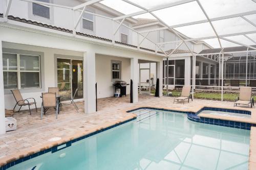 1578 - Beautiful spacious house near Disney with Private Pool & FREE grill use in Champions Gate Oasis Resort - image 5