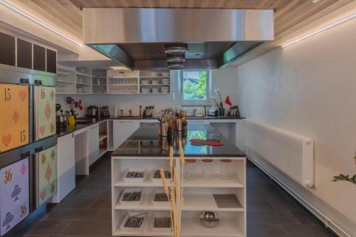 Kitchen, GRAND your home with common kitchens with self check-in in Engelberg