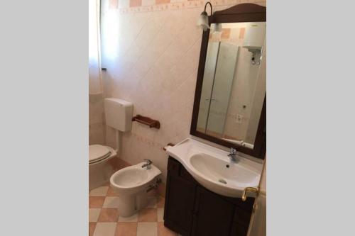 Casa a schiera fronte lago con giardino