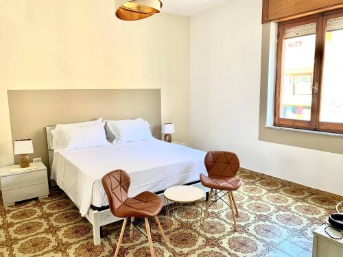 Room in BB - City Bb Chic Room with shared bathroom chambre d'hôte Lu Bagnu