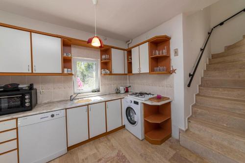 Lovely House with Superb View of Bodrum in Gumusluk