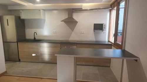 virtuve, Xia Apartaments con acceso a piscina in Rialp