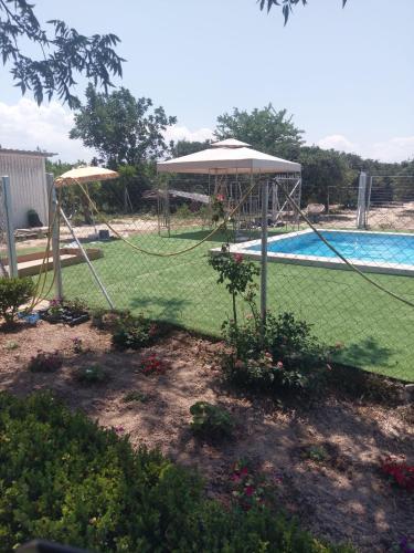 Holiday home next to orange tree orchard