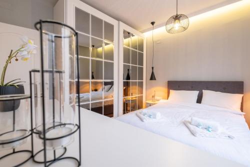 Designer & Cozy 2BD Flat with a parking in the city center by Flat Mаnager