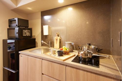 Kitchen, MONday Apart Premium KYOTO Station - Formerly MONday Apart Premium Kyoto Shichijo Horikawa in Kyoto