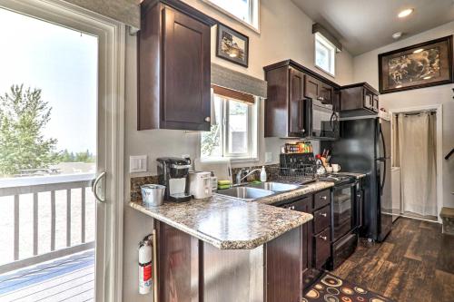 Eureka Tiny Home with Hot Tub and Community Beach! in Glen Lake