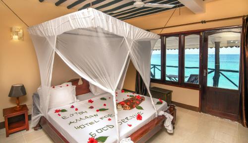 Amaan Beach Bungalows - Tap to explore photos