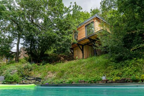 Le Moonloft insolite Tiny-House dans les arbres & 1 séance de sauna pour 2 avec vue panoramique gîte à louer Osenbach