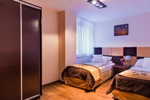 Boutique Hotels III Ideally located in the prime touristic area of Lodz City Center, Boutique Hotels III promises a relaxing and wonderful visit. The hotel has everything you need for a comfortable stay. All the necessa