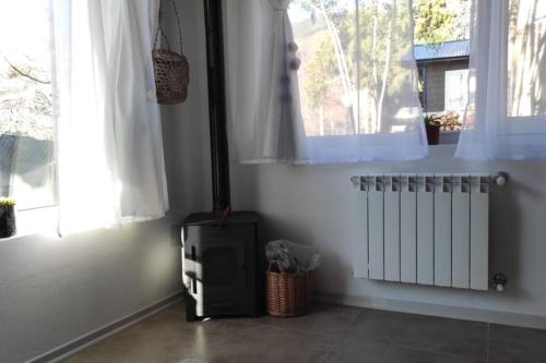 Cabana tipo ph, acogedora con chimenea interior.