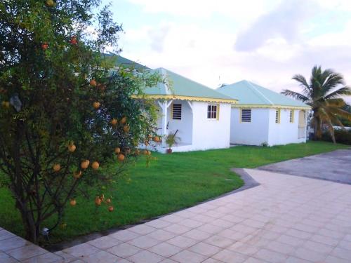 Εξωτερική όψη, Maison chaleureuse à Le Moule avec piscine partagée (Maison chaleureuse a Le Moule avec piscine partagee) in Λε Μούλ