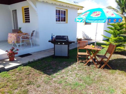 Balkons/terase, Chaleureuse maison au Moule avec piscine partagée (Chaleureuse maison au Moule avec piscine partagee) in Le Moule