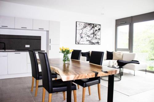 Luxurioses Neubau-Apartment mit e-Lade Parkplatz 1.5km von d Badisch Bühn entfernt