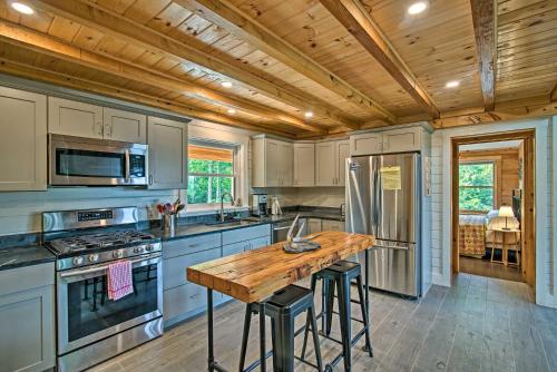 2-Acre Lakefront Greenville Home with Cottage and Dock - image 11