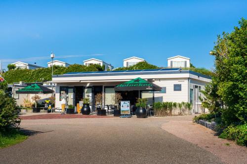 餐廳, Chalet Ibiza in de duinen van IJmuiden aan Zee in 艾默伊登