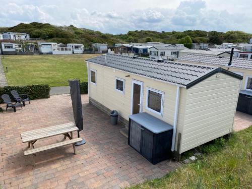 花園, Chalet Ibiza in de duinen van IJmuiden aan Zee in 艾默伊登