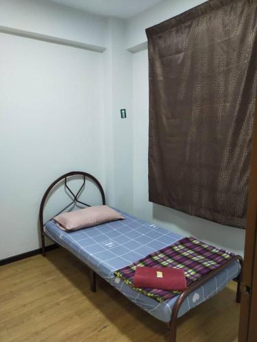 HOLIDAY APARTMENT AT PD PERDANA CONDO RESORT photo