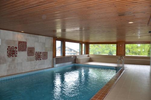 Úszómedence, Immeuble Les Melezes in Vex