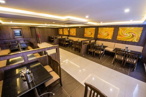 Restaurant, Plaza Hotels Trichy in Tiruchirappalli