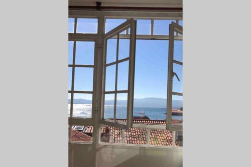  Unha ventá á ría in Muros