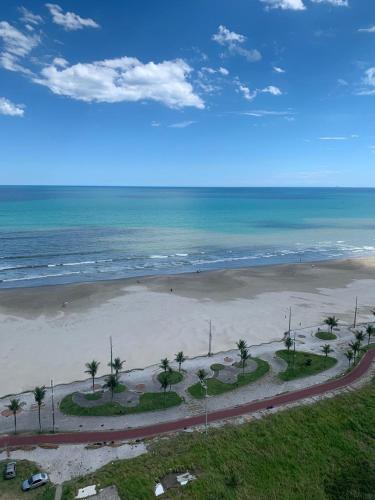 Ap.Frente para o mar Pé na areia c/ Var. Goumert Condominio Costa do Sol (Ap.Frente para o mar Pe na areia c/ Var. Goumert Condominio Costa do Sol) in โนวามิริง
