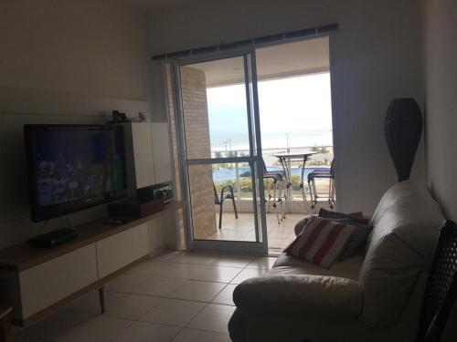 Ap.Frente para o mar Pé na areia c/ Var. Goumert Condominio Costa do Sol (Ap.Frente para o mar Pe na areia c/ Var. Goumert Condominio Costa do Sol) in โนวามิริง