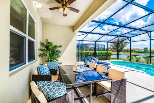 Solterra Stunner- 6 bedroom home with a south facing pool overlooking lagoon game room in a gated resort - image 2