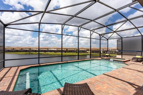 Sunset View- 8 bedroom luxury villa with a private pool & spa located in a gated resort community - image 4