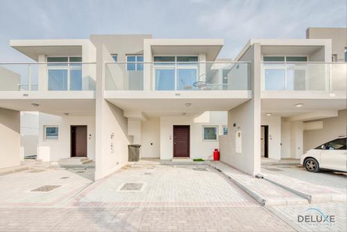 Exterior view, Opulent 3BR Townhouse at DAMAC Hills 2 Dubailand by Deluxe Holiday Homes in Damac Hills 2
