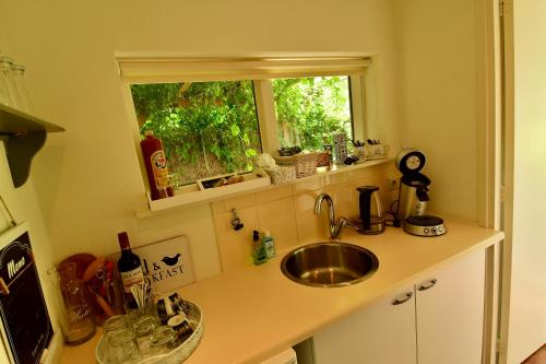 设施服务, 德菲尔德林旅馆 (De Veldeling) in 胡吉文