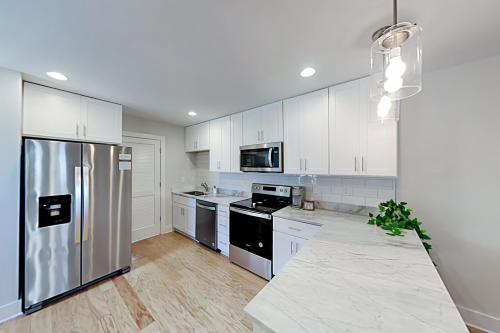 Watkins Getaway - 4 Townhomes - Central Location townhouse - main image