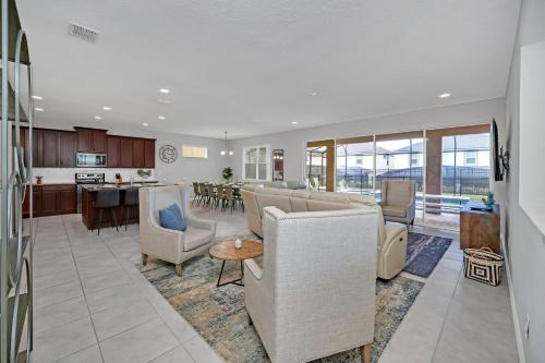 Near Disney - 9BR Resort Mansion - Private Pool Hot Tub and BBQ! - image 4