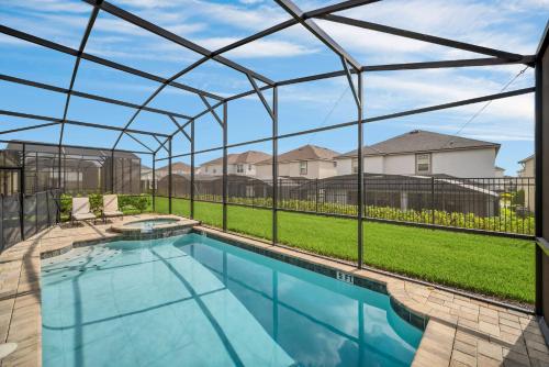 Near Disney - 9BR Resort Mansion - Private Pool Hot Tub and BBQ! - image 11