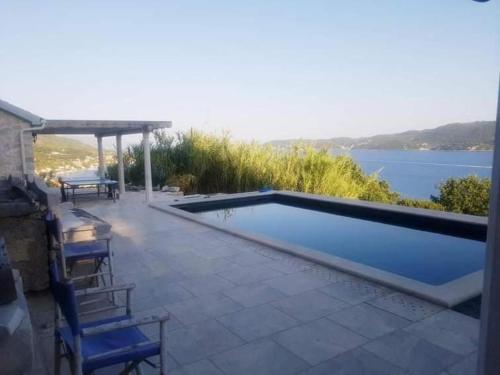 300 year old 3 BR stone cottage with Green Marble Pool on historic footpath with panoramic seaview
