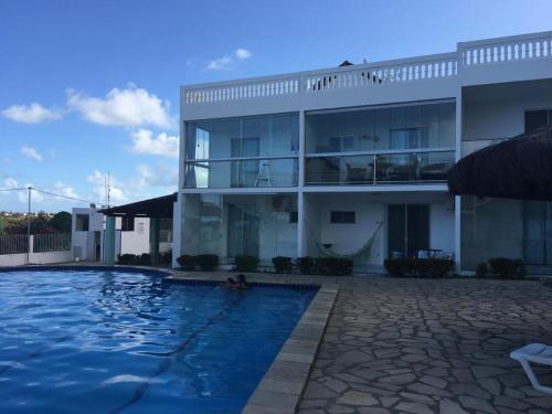 Residencial Granito e Jasmim Flat Cobertura em Jacumã Frente ao Mar