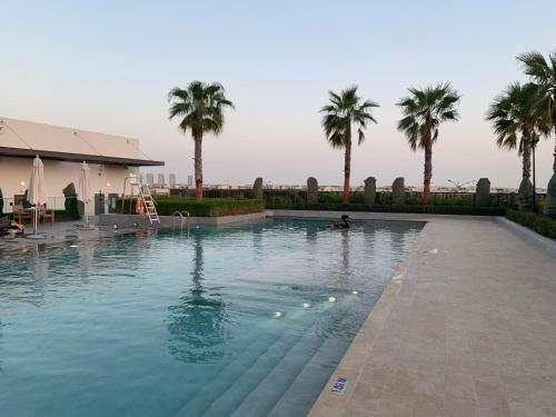 View, Delightful 3BR Townhouse at DAMAC Hills 2 Dubailand by Deluxe Holiday Homes in Damac Hills 2