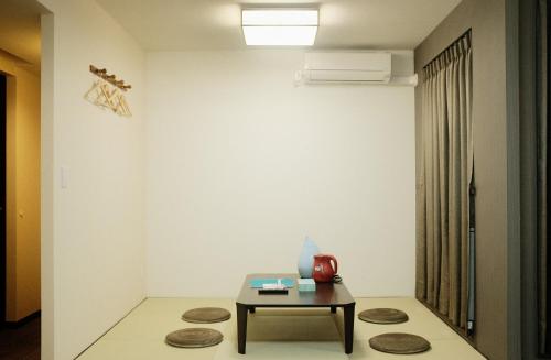 KYU KYU HOTEL Room Type - Family Room with Balcony