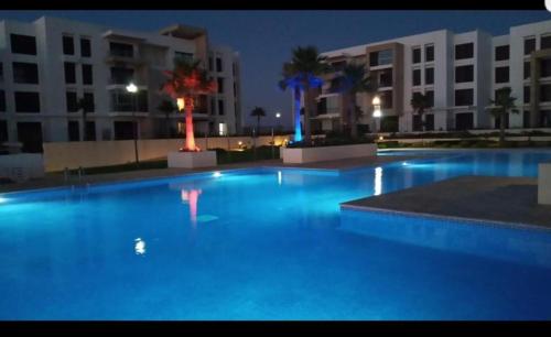 Swimming pool, Superbe appartement Front de mer Prestigia in Sidi Bouqnadel