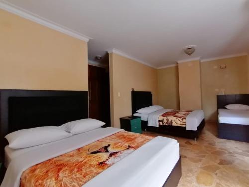 2 double beds, 1 twin bed