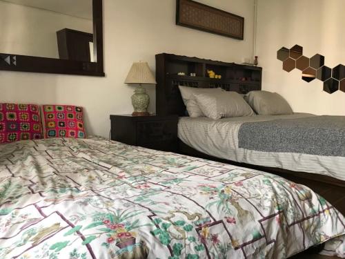 1 king bed, 1 futon bed