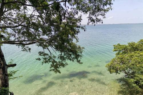 Casa Agua Bacalar / Naajil Ha