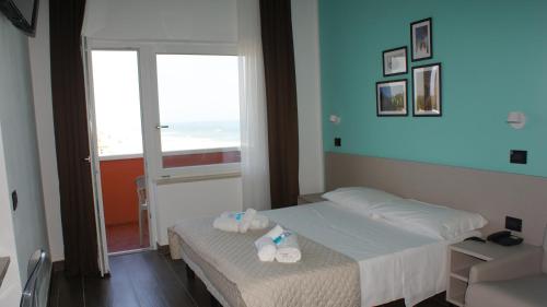 Hotel Palazzo Caveja Room Type - Double or Twin Room with Side Sea View