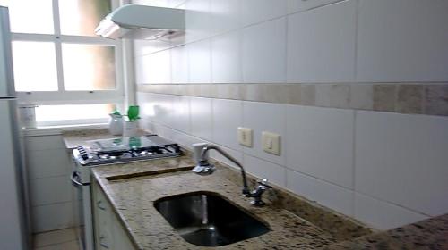 Casa com piscina e churrasq na Praia de Camburi