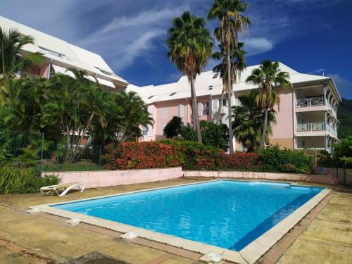 Charmant appartement en bord de mer avec piscine - Location saisonnière - Gourbeyre